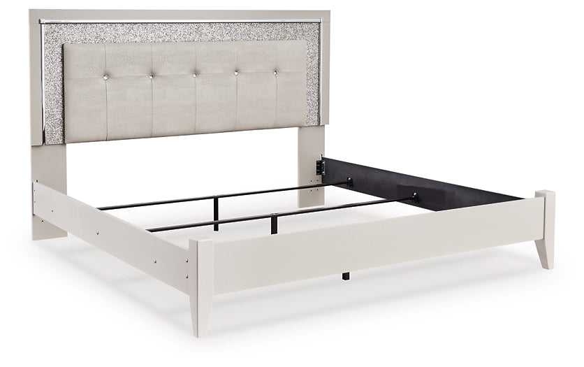 Zyniden King Upholstered Panel Bed with Mirrored Dresser and Chest