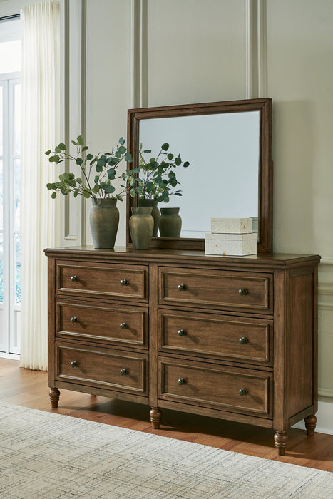 Sturlayne King Upholstered Panel Bed with Mirrored Dresser